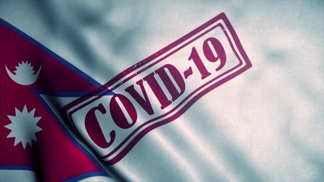 Covid-19 stamp on the national flag of Nepal. Coronavirus concept