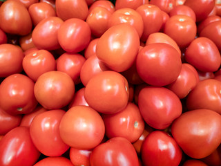 Ripe fresh red tomatoes close -up.