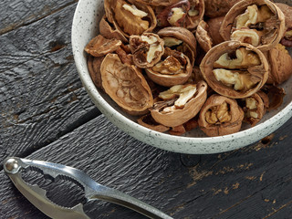 Walnuts lie on a light colored background
