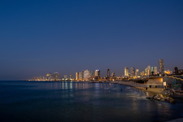Fototapeta premium Tel Aviv skyline at night from Jaffa