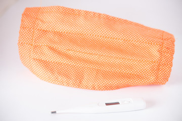 Coronavirus prevention item, medical surgical masks, spray alcohol and hand sanitizer gel for cleaning, hygiene and protect ill, germ, virus and bacteria on white backgroud..