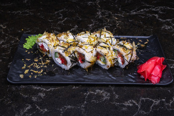 sushi with fish shrimps and so on.sushi on a black background