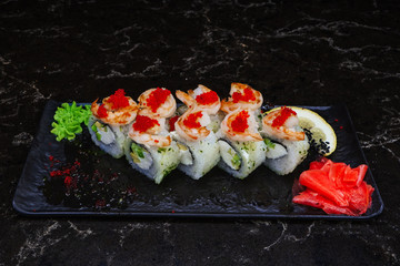 sushi with fish shrimps and so on.sushi on a black background