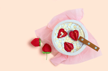 Oatmeal with strawberry is made of paper