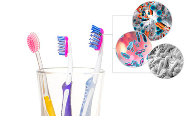 Dental hygiene. Tooth brushes with bacteria in glass