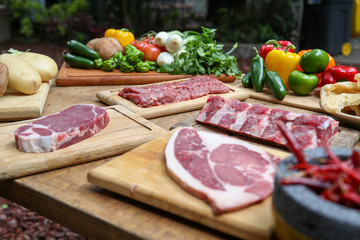 raw meat and vegetables