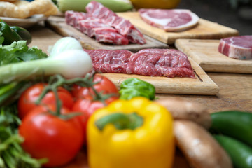 fresh vegetables on the table with raw meat
