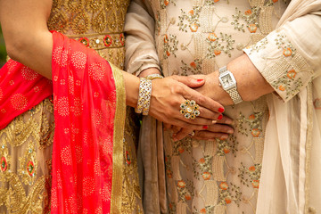 Fototapeta na wymiar hands of woman in traditional dress