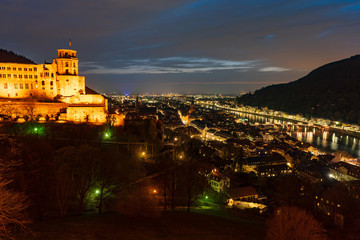 Fototapeta na wymiar City of Heidelberg (Germany) at 19.03.2020 - view over the old town of Heidelberg including the castle