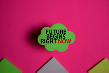 Future Begins Right Now write on a sticky note isolated on Office Desk.