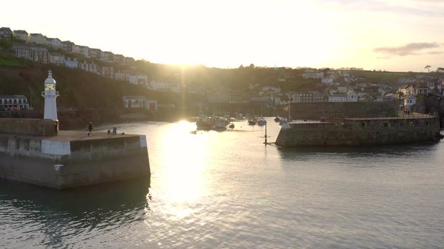 A Lighthouse on the Breakwater of Mevagissey in Cornwall UK