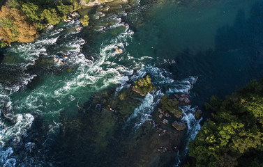 Fototapeta na wymiar Rhine falls (Rheinfalls) the largest plain waterfall in Europe. It is located near Schaffhausen between the cantons of Schaffhausen and Zurich in Switzerland