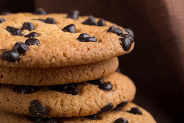 Stacked chocolate oat cookies Close up. Tasty snack and Sweet dessert