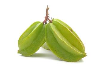 Star fruits Isolated on white background. Carambola, or star fruit, is the fruit of Averrhoa...
