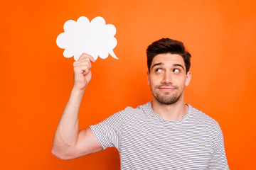 Photo of funny cheerful guy raise arm with empty paper mind cloud showing dialogue answer read text...