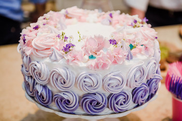 Colorful accessories for children's parties. Happy birthday concept. Kids birthday party decoration. Colorful cake. Decorated table for child birthday