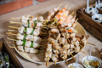 Banquet service. Catering food, snacks with cheese. Salat with shrimp. Different colorful meals for breakfast or lunch time. Meat canape