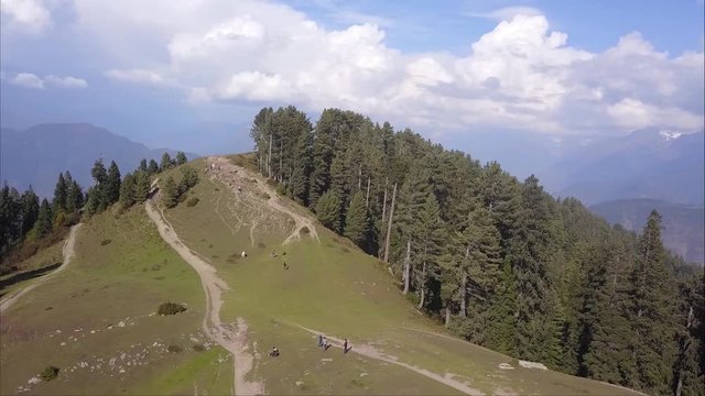 Aerial zooming out shot of sri paye top - shogran mountain in Pakistan 