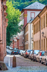 Heidelberg medieval street with parked cars, Germany