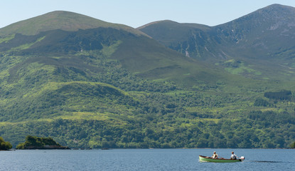 Killarney, Ireland - 7th July 2013: Fishing boat on the scenic  lakes of Killarney national park