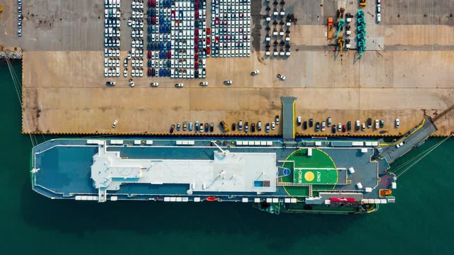 Aerial view ro-ro ship, Cargo ship transportation of business logistic sea freight, New Cars produced by year up in the port for Cargo ship and Cargo import-export around in the world