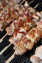 chicken on grill and bacon