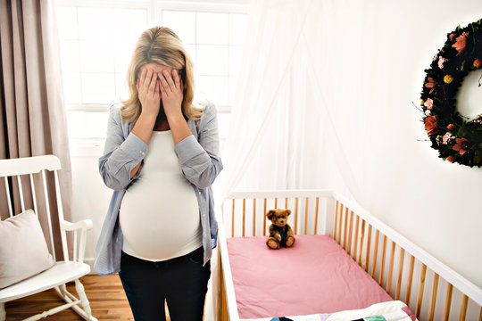 Pregnant woman with a lot of stress at home