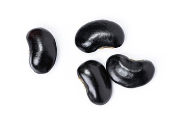 Black beans ( Urad dal, black gram or vigna mungo ) isolated on white background . Top view.