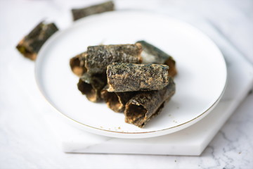 A seaweed roll made from seaweed sesame meat floss