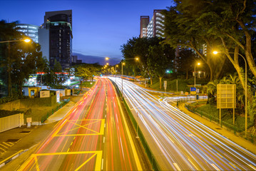 Fototapeta na wymiar Singapore 2018 Jalan Bukit Merah during blue hour with car light streak 