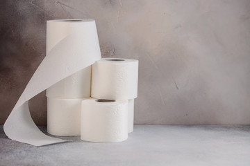 Close up of toilet paper and desinficant. Panic buying (Hamsterkäufe) because of coronavirus