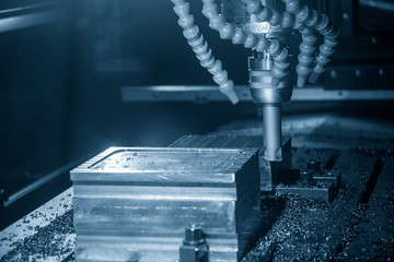 The CNC milling machine rough cutting  the injection mold parts by indexable  endmill tools. The...