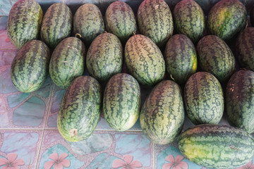 selective focus on fresh green tropical watermelon for sale and eat