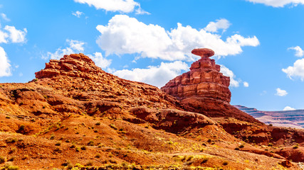 The sombrero-shaped rock outcropping on the northeast edge of the town named Mexican Hat, Utah, USA