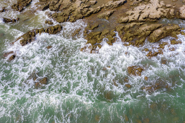 splash water sea and rock stone aerial view