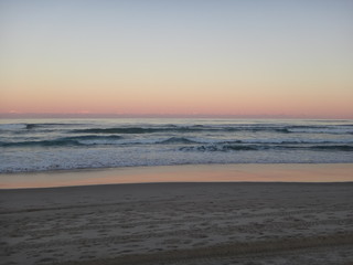 sunset on the beach - byron bay - australia