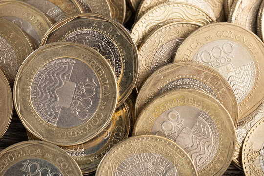 pile of Colombian peso coins, close-up image