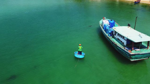 Phu Quoc beach, flight over a small local fishing village, Vietnam drone aerial footage