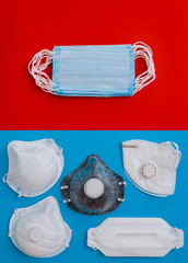 White variety mask respirator on a blue background. The face mask protects against environmental pollution, flu viruses and coronavirus.