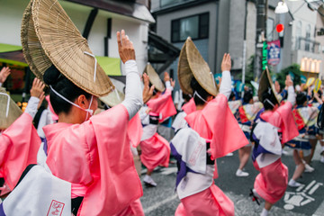 Women dancing Japanese traditional dance at summer festival