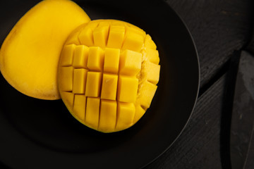delicious mango fruit cut into squares