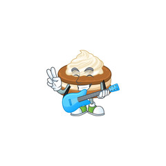Supper talented white cream alfajor cartoon design with a guitar
