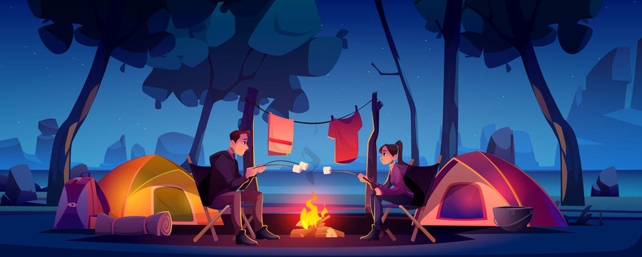 Summer camp with couple, tent and campfire at night. Vector cartoon landscape of two people in natural parkland, countryside with lake and mountains on background. Picnic on river beach