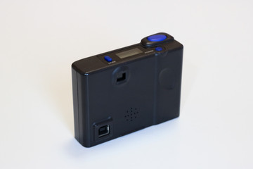 Fototapeta premium First generation digital compact photographic camera, isolated on white background.