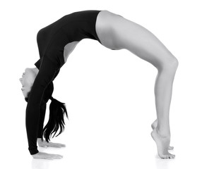 Pretty woman in bridge yoga pose, white background