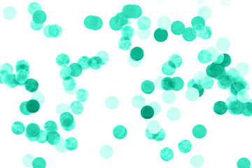 Bright mint confetti isolated on white background.