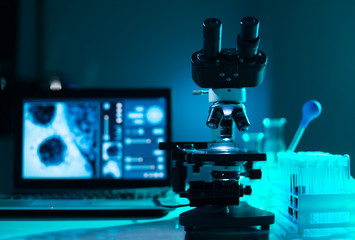 Close-up of scientific microscope. Laboratory in hospital. Epidemic disease, healthcare, vaccine research and coronavirus covid-19 test.