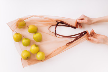 Eco packs. Eco bag with apples. Purchase without harm to nature in anti-plastic bags. Zero Waste.