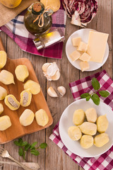 Potato gnocchi stuffed with radicchio and ricotta.