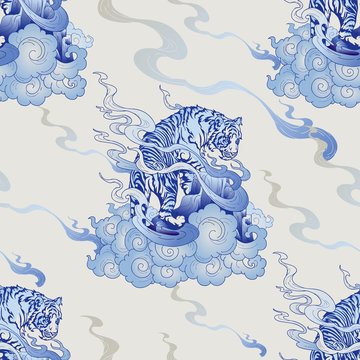 Tiger Climbing with cloud design with oriental style with blue Porcelain seamless pattern vector background 